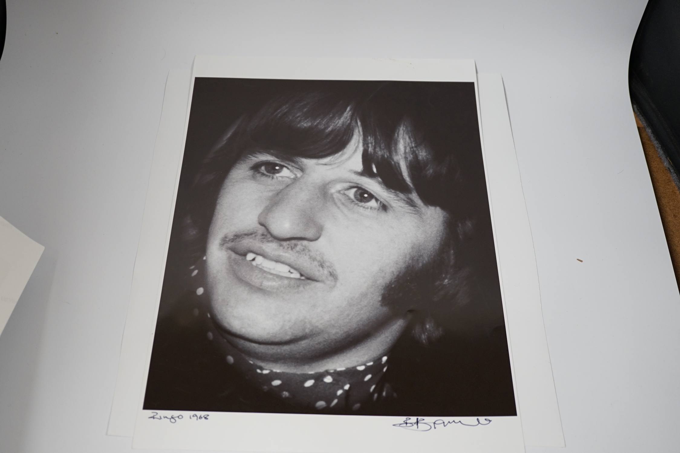 Three photographs of the Beatles by Bill Zygmant; John Lennon, Ringo Starr and George Harrison, all signed by Zygmant and two dated 1968, largest 48 x 33cm